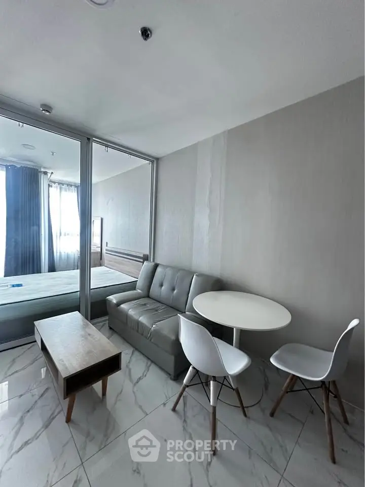 Modern apartment interior with sleek furniture and natural light