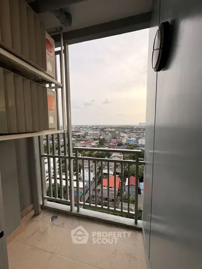 High-rise balcony with panoramic city view, perfect for urban living.