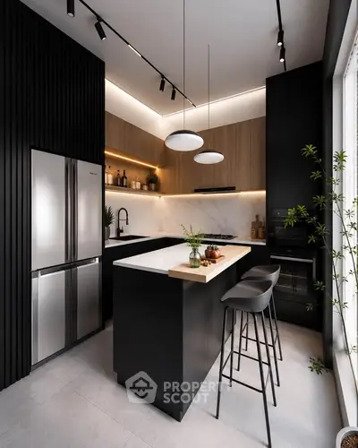 Modern kitchen with sleek black cabinetry, island seating, and stainless steel appliances in a stylish apartment.