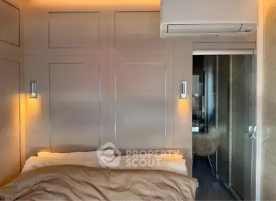Modern bedroom with ambient lighting and air conditioning