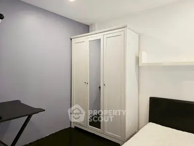 Cozy bedroom with wardrobe and modern decor