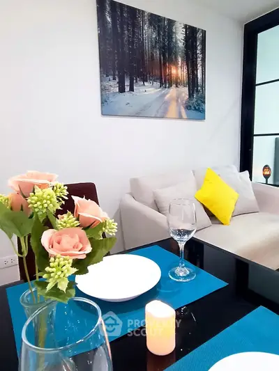 Chic modern living room with elegant dining setup and cozy decor