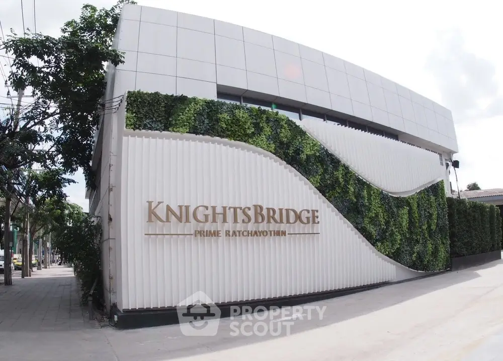 Modern Knightsbridge Prime Ratchayothin building exterior with lush vertical garden.