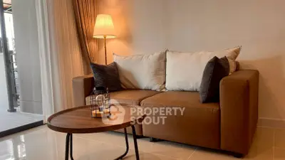 Cozy living room with elegant sofa and stylish lamp for modern comfort