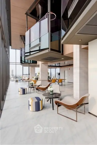 Luxurious modern living room with high ceilings and panoramic city views.
