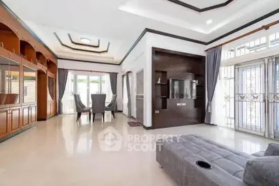 Spacious living room with elegant dining area and modern decor