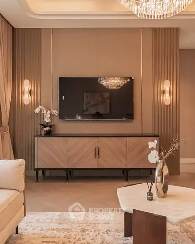 Luxurious living room with elegant decor and modern TV setup