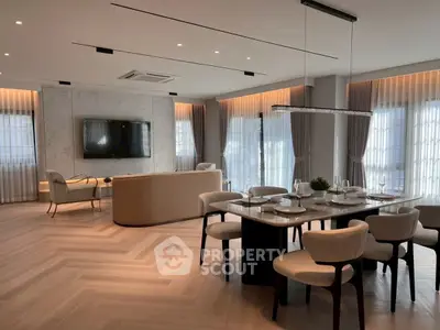 Luxurious modern living room with elegant dining area and stylish decor