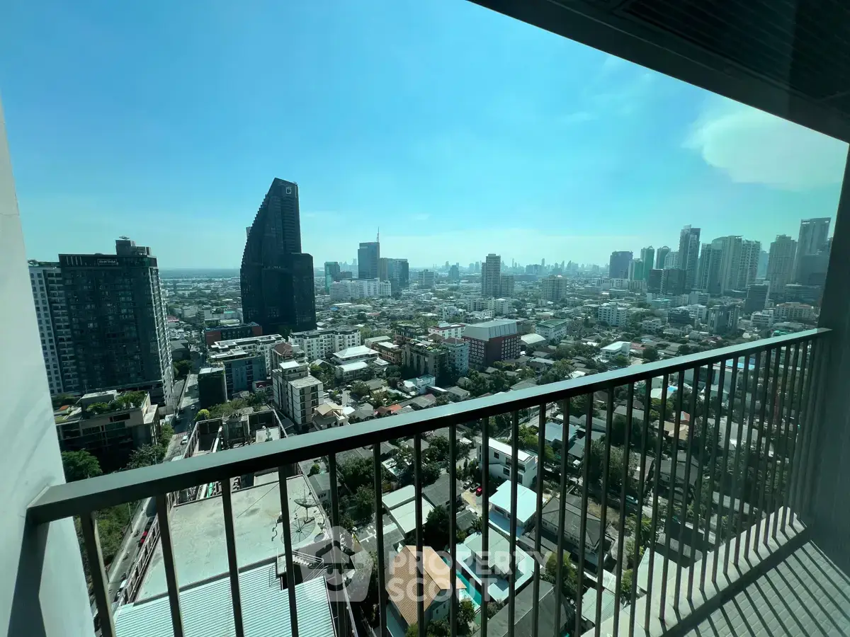 Stunning cityscape view from a high-rise balcony, perfect for urban living enthusiasts.