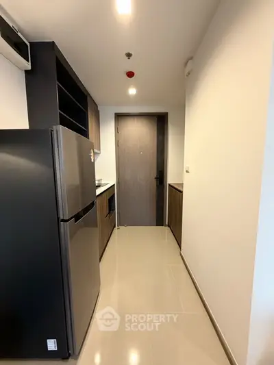 Modern kitchen with sleek appliances and minimalist design