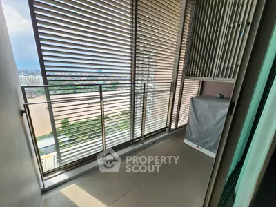 Modern balcony with city view and sleek blinds, perfect for urban living.