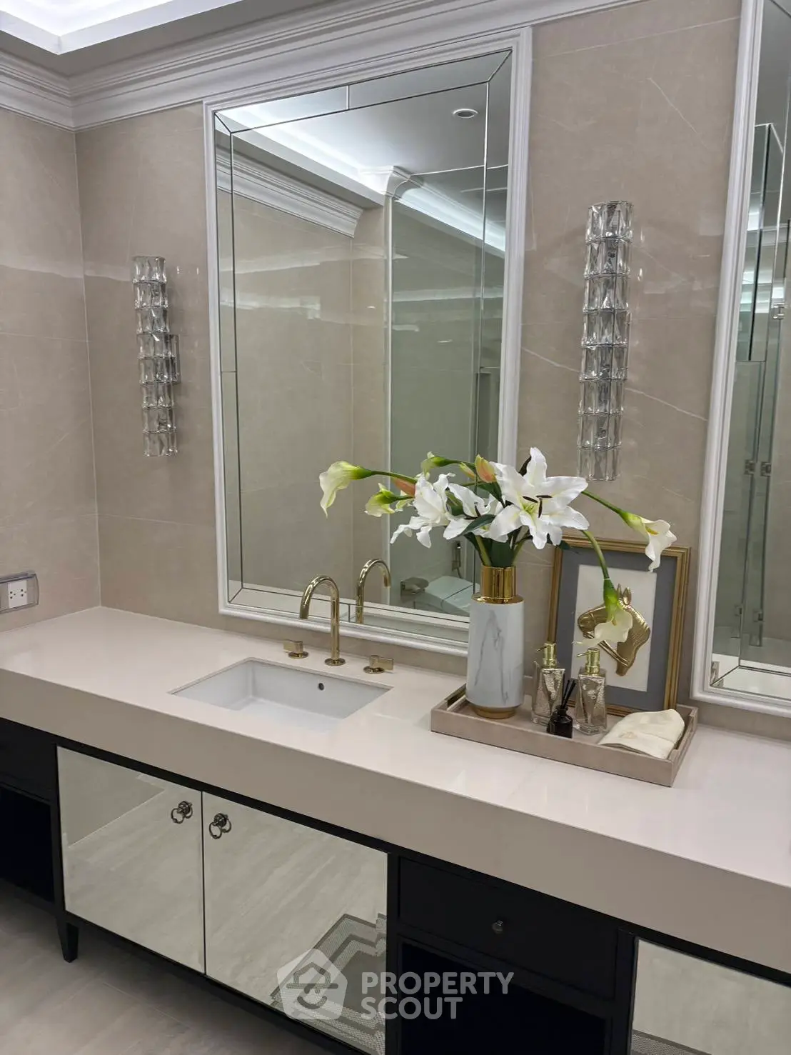 Luxurious bathroom with elegant vanity and floral decor