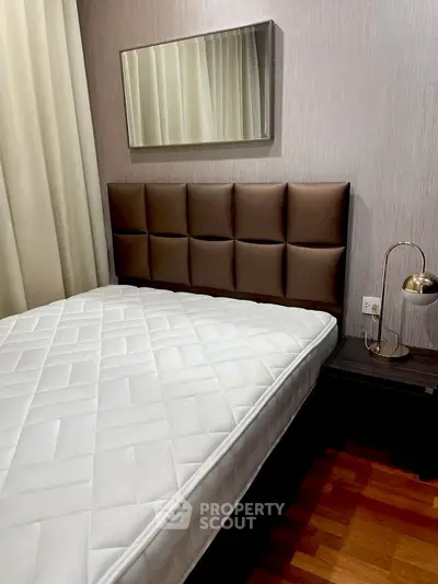 Cozy bedroom with modern decor and comfortable mattress, ideal for restful nights.