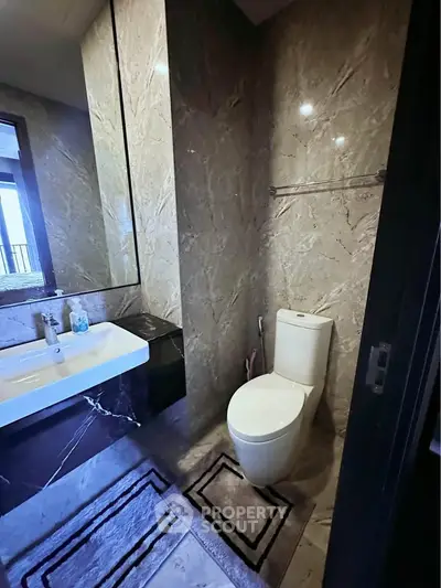 Luxurious marble bathroom with modern fixtures and elegant design
