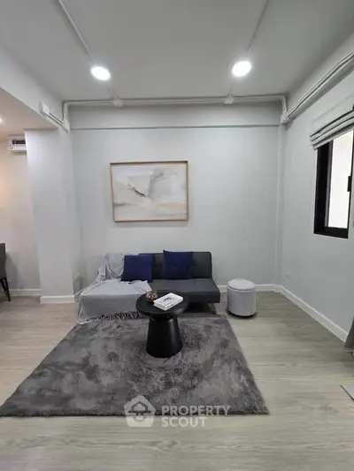 Modern living room with stylish decor and cozy seating area