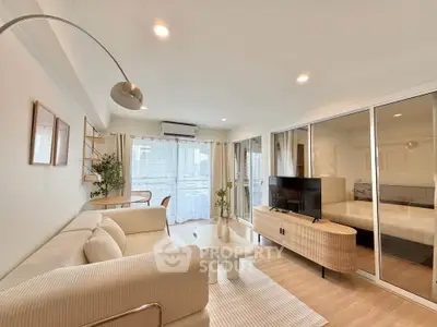 Spacious modern living room with elegant decor and natural light
