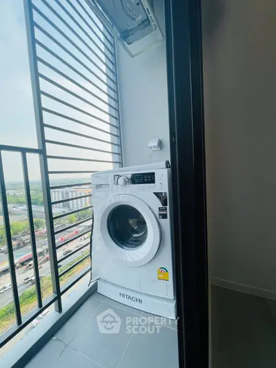 Modern apartment balcony with washing machine and scenic view
