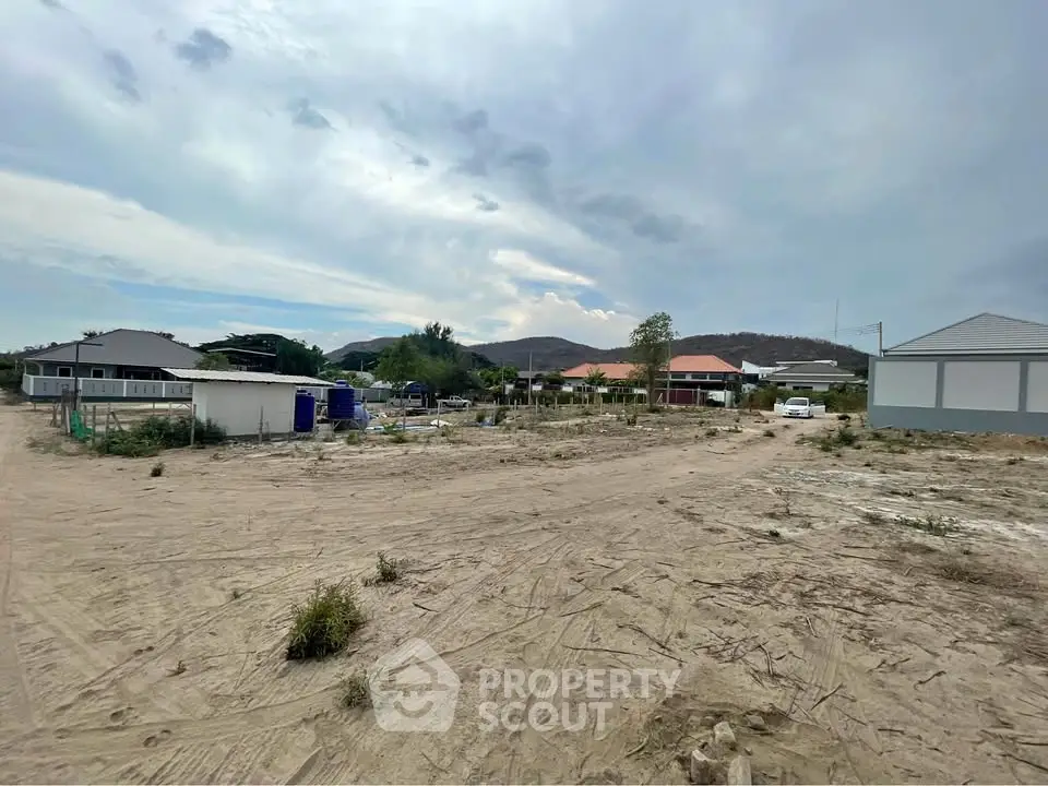 Expansive vacant land with scenic mountain views, ideal for development opportunities.