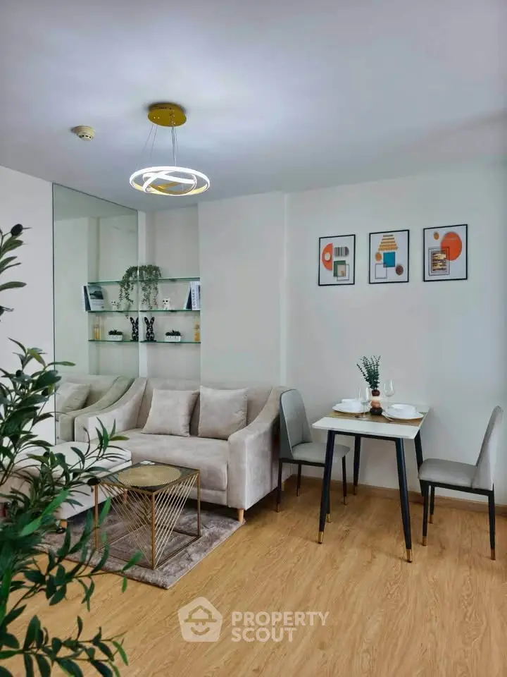 Modern living room with stylish decor and cozy seating area, perfect for relaxation and entertaining.