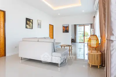 Spacious modern living room with elegant decor and natural light
