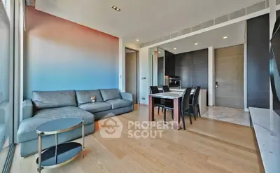Modern living room with stylish furniture and open layout in luxury apartment.