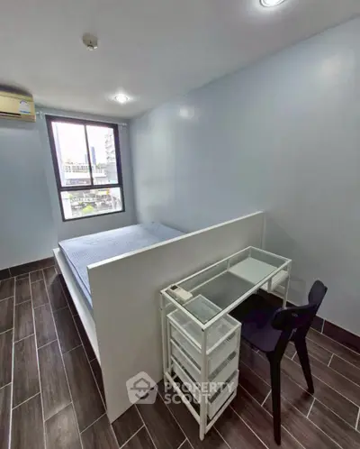 Modern minimalist bedroom with sleek design and city view window, perfect for urban living.