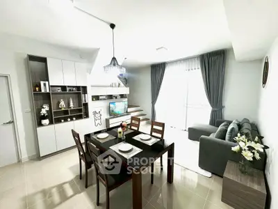 Modern living room with dining area and stylish decor