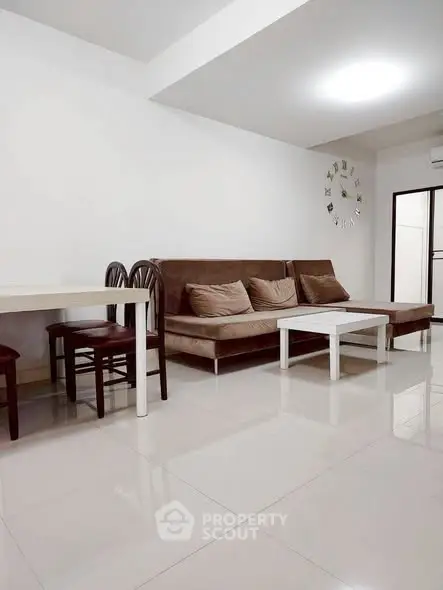 Modern living room with sleek furniture and minimalist decor