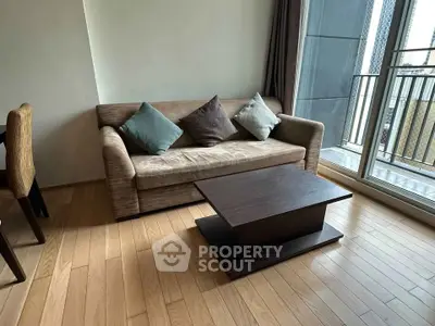 Modern living room with cozy sofa and balcony view in stylish apartment