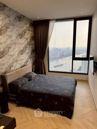 Luxurious bedroom with stunning river view and modern decor
