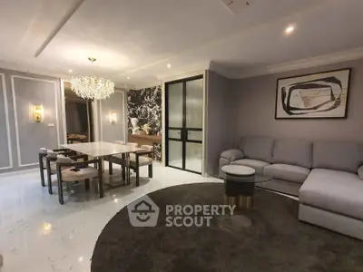 Luxurious living room with elegant chandelier and modern decor