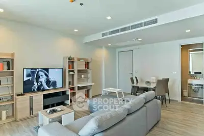 Modern living room with stylish furniture and open layout in a contemporary apartment.