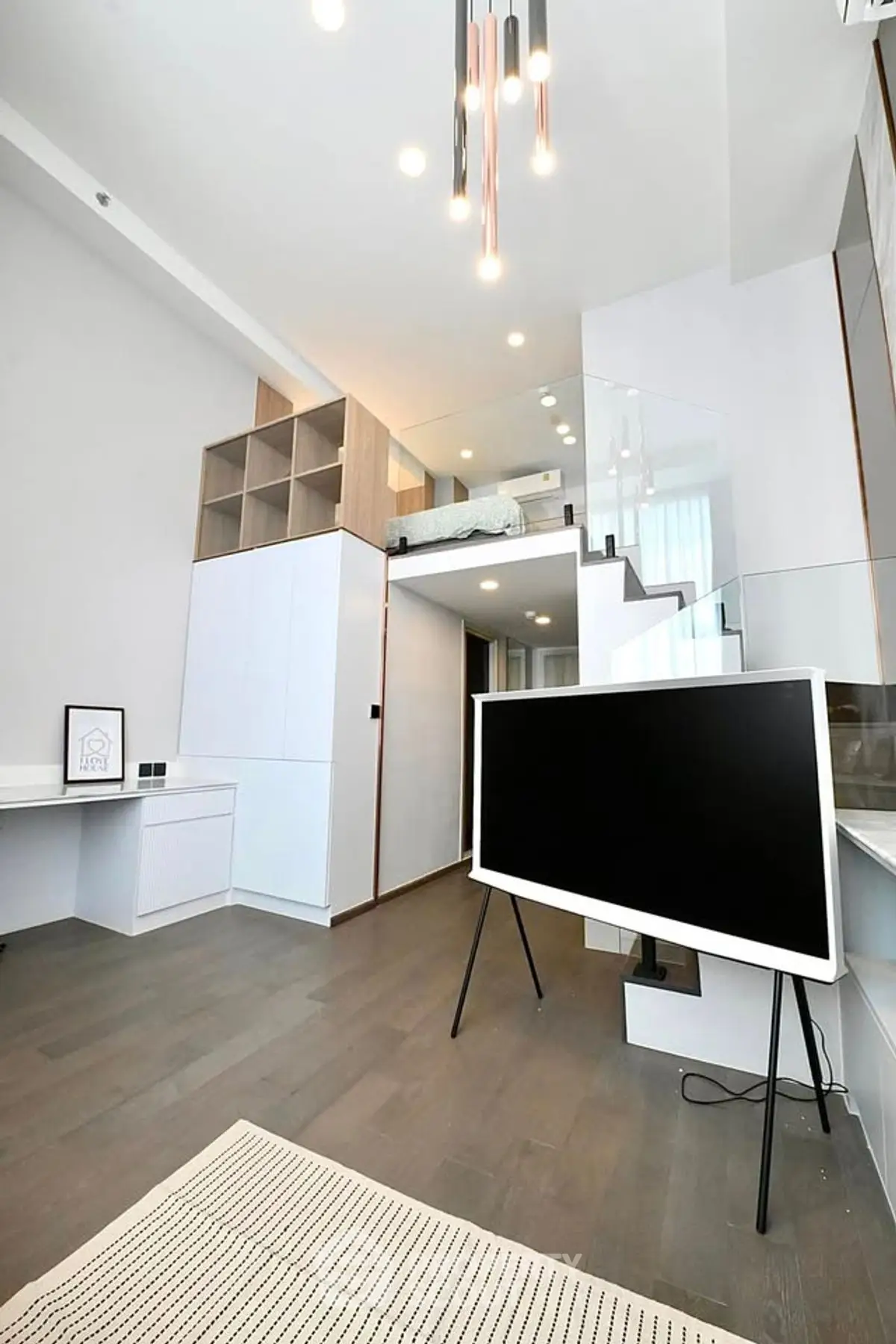 Modern loft-style living room with high ceilings and sleek design