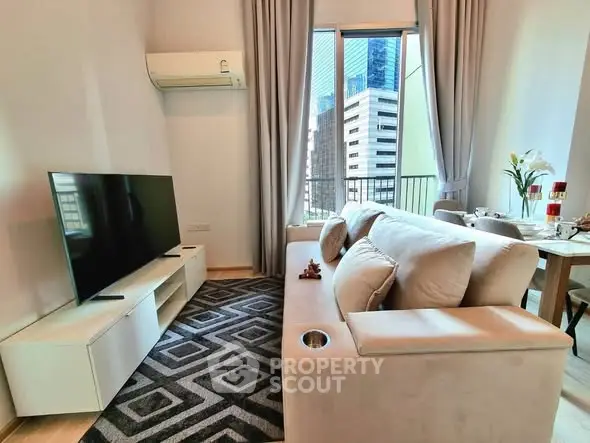 Modern living room with city view, stylish furniture, and natural light