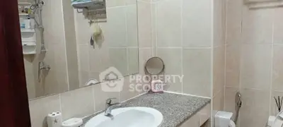 Modern bathroom with elegant fixtures and granite countertop