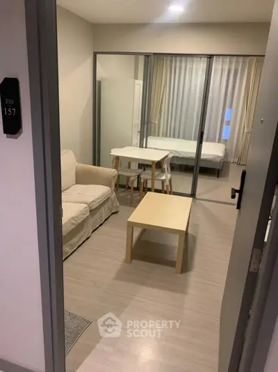 Modern studio apartment with open layout and cozy furnishings