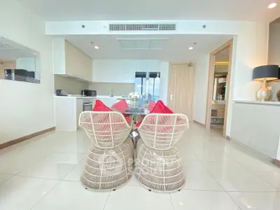 Modern open-layout kitchen with stylish dining area and contemporary decor