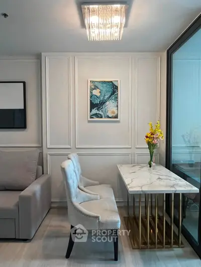 Elegant living room with modern decor and marble table