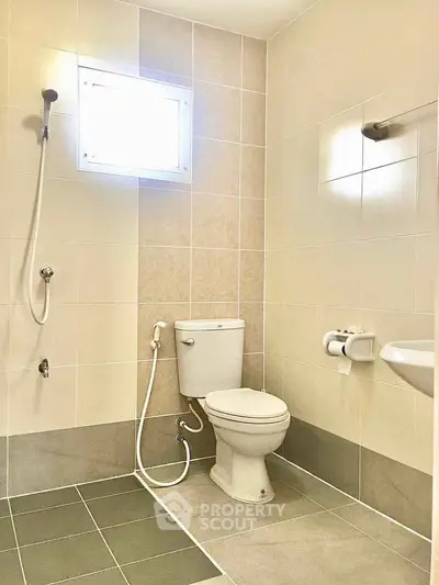 Modern bathroom with shower and toilet in minimalist design