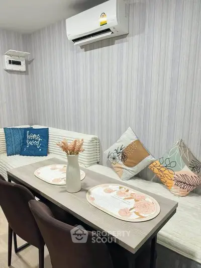 Chic dining area with modern decor and cozy seating, perfect for intimate gatherings.