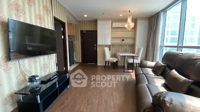 Luxurious living room with elegant decor and large windows in modern apartment