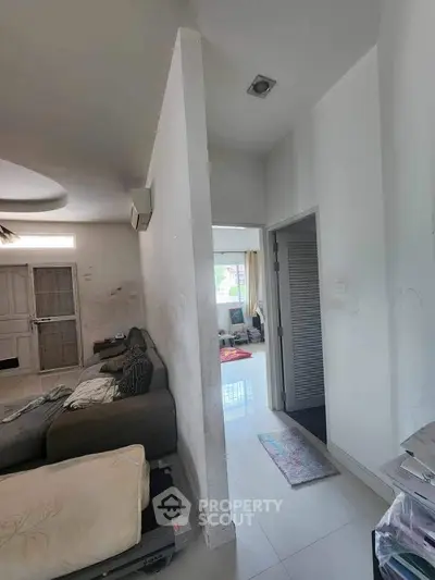 Spacious living area with modern design and natural light