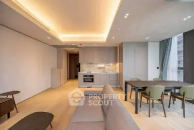 Spacious modern living room with open kitchen and elegant dining area