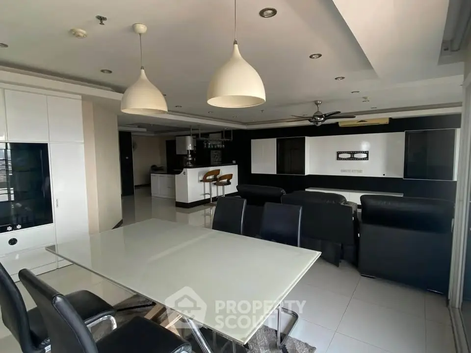 Spacious modern living room with sleek furniture and open layout