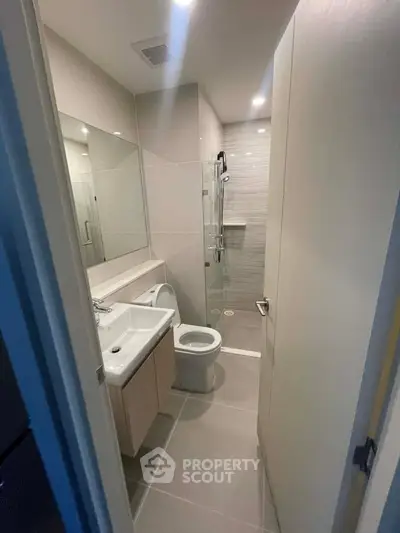 Modern bathroom with sleek design and glass shower enclosure