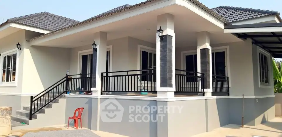 Charming modern house with spacious balcony and elegant exterior design