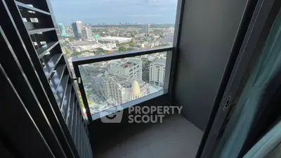 Stunning cityscape view from a modern high-rise balcony, perfect for urban living enthusiasts.