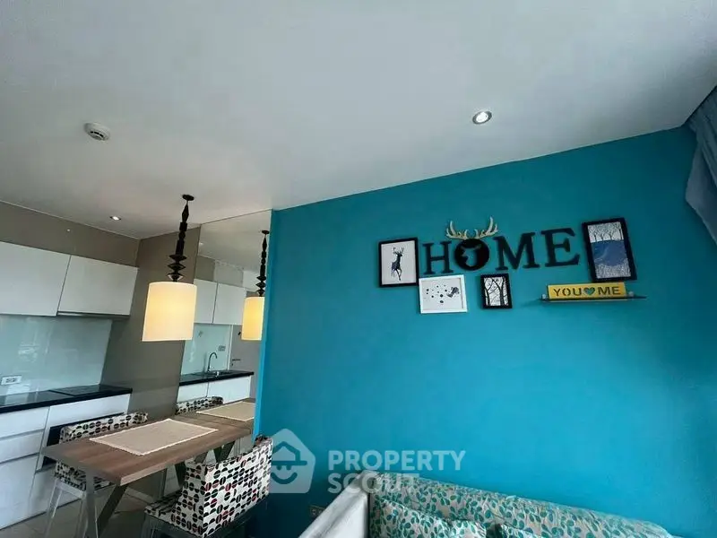 Modern living room with stylish decor and open kitchen layout