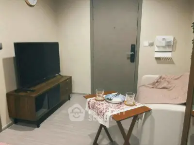 Cozy living room with modern TV stand and comfortable seating