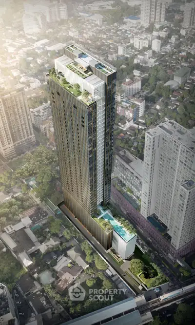 Stunning aerial view of a modern high-rise building with rooftop pool and lush greenery, set in a vibrant urban landscape.